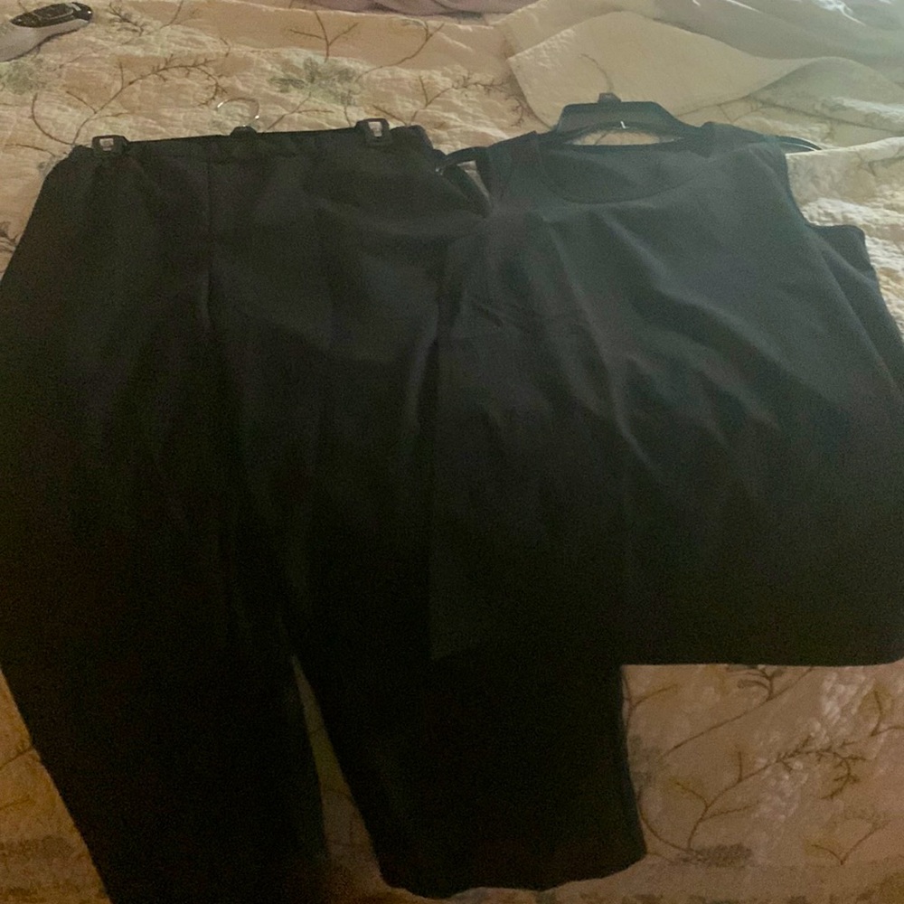 Black two piece pant set .pants and matching top.